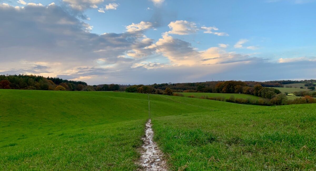 Trail running path across hills